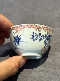 A pair of Chinese polychrome-decorated cups and saucers and an iron-red gilt-decorated cup and saucer, Yongzheng/Qianlong