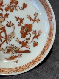 A pair of Chinese polychrome-decorated cups and saucers and an iron-red gilt-decorated cup and saucer, Yongzheng/Qianlong