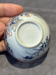 A pair of Chinese polychrome-decorated cups and saucers and an iron-red gilt-decorated cup and saucer, Yongzheng/Qianlong