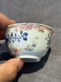 A pair of Chinese polychrome-decorated cups and saucers and an iron-red gilt-decorated cup and saucer, Yongzheng/Qianlong