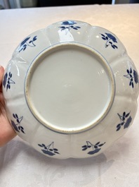 A pair of Chinese blue and white lotus-form 'Grasshopper' plates, Kangxi