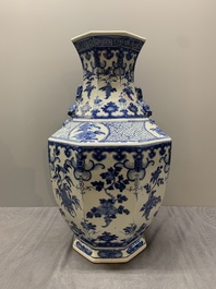 A pair of Chinese blue and white octagonal vases with floral design, 19th C.