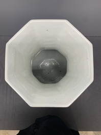 A pair of Chinese blue and white octagonal vases with floral design, 19th C.