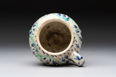 A polychrome pottery Kutahya cup and a mug, Turkey, 18th C.