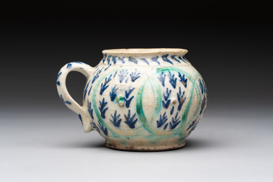 A polychrome pottery Kutahya cup and a mug, Turkey, 18th C.