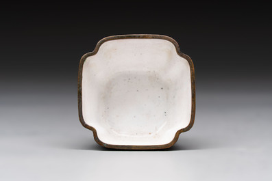 A Chinese Canton saucer, a cup and a covered box, 18th C.