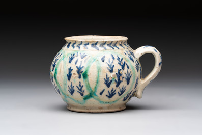 A polychrome pottery Kutahya cup and a mug, Turkey, 18th C.