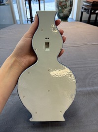 A pair of Chinese famille rose blue-ground wall pocket vases with floral design, Jing Shun Tang 經筍堂 mark, 19th C.