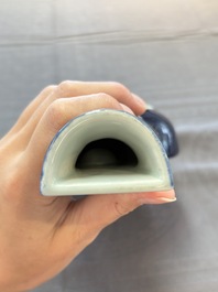 A pair of Chinese famille rose blue-ground wall pocket vases with floral design, Jing Shun Tang 經筍堂 mark, 19th C.