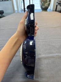 A pair of Chinese famille rose blue-ground wall pocket vases with floral design, Jing Shun Tang 經筍堂 mark, 19th C.