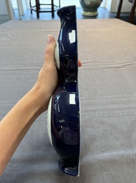 A pair of Chinese famille rose blue-ground wall pocket vases with floral design, Jing Shun Tang 經筍堂 mark, 19th C.