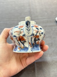 Three Chinese Imari-style teapots and two blue and white jugs, Kangxi