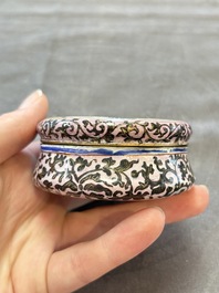 A Chinese Canton saucer, a cup and a covered box, 18th C.