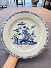 Five Chinese blue and white 'birds and flowers' and 'peony scroll' plates and dishes, 18/19th C.