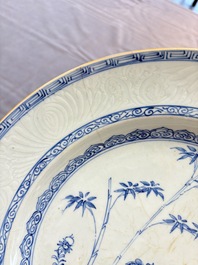 Five Chinese blue and white 'birds and flowers' and 'peony scroll' plates and dishes, 18/19th C.