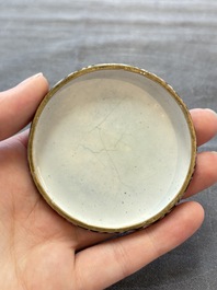 A Chinese Canton saucer, a cup and a covered box, 18th C.