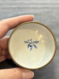 A Chinese Canton saucer, a cup and a covered box, 18th C.