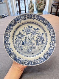 Nine Chinese blue and white plates with figural design, 18th C.