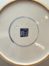 Nine Chinese blue and white plates with figural design, 18th C.