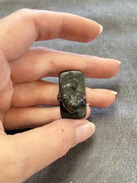 Five Chinese bronze seals and an Indonesian bronze figure group, 18/19th C.