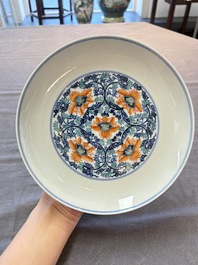 A Chinese doucai plate with floral scroll design, Tongzhi mark, 19/20th C.