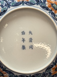 A Chinese doucai plate with floral scroll design, Tongzhi mark, 19/20th C.