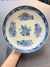 Seven Chinese blue and white plates and dishes with floral design, 18th C.