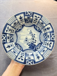 Five Chinese blue and white 'kraak' and 'kraak'-style plates, a saucer and a bowl, Ming/Qing