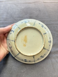 Five Chinese blue and white 'kraak' and 'kraak'-style plates, a saucer and a bowl, Ming/Qing