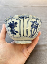 Five Chinese blue and white 'kraak' and 'kraak'-style plates, a saucer and a bowl, Ming/Qing