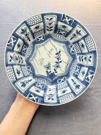 Five Chinese blue and white 'kraak' and 'kraak'-style plates, a saucer and a bowl, Ming/Qing