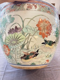 A Chinese famille rose 'mandarin ducks in a lotus pond' scroll pot, 19th C.