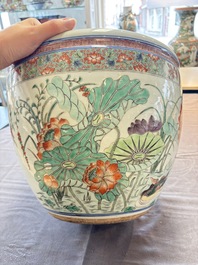 A Chinese famille rose 'mandarin ducks in a lotus pond' scroll pot, 19th C.