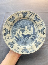 Five Chinese blue and white 'kraak' and 'kraak'-style plates, a saucer and a bowl, Ming/Qing