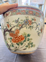 A Chinese famille rose 'mandarin ducks in a lotus pond' scroll pot, 19th C.