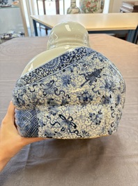 A Chinese blue, white and iron-red Milefo Buddha, Zhu Mao Ji 朱茂記造 mark, 20th C.