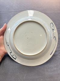 Five Chinese blue and white 'kraak' and 'kraak'-style plates, a saucer and a bowl, Ming/Qing