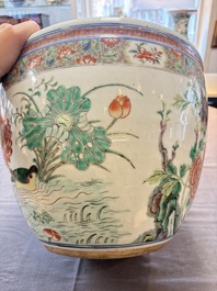 A Chinese famille rose 'mandarin ducks in a lotus pond' scroll pot, 19th C.