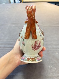 A pair of Chinese famille rose sauceboats and stands with floral design, Qianlong