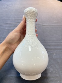 A Chinese white-glazed garlic-head vase and a robin&rsquo;s egg-glazed vase, Qianlong mark, 20th C.