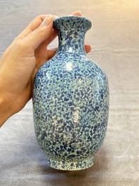 A Chinese white-glazed garlic-head vase and a robin&rsquo;s egg-glazed vase, Qianlong mark, 20th C.