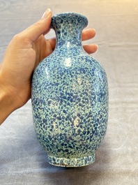 A Chinese white-glazed garlic-head vase and a robin&rsquo;s egg-glazed vase, Qianlong mark, 20th C.