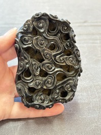 A Chinese fine huanghuali sculpture of a Luohan on a zitan stand, Qianlong mark, 19/20th C.