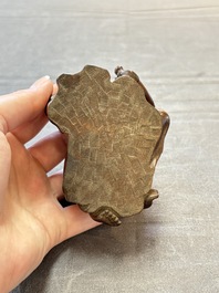 A Chinese fine huanghuali sculpture of a Luohan on a zitan stand, Qianlong mark, 19/20th C.