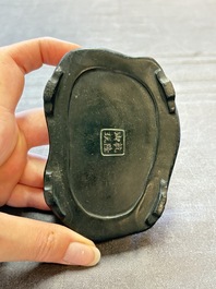 A Chinese fine huanghuali sculpture of a Luohan on a zitan stand, Qianlong mark, 19/20th C.