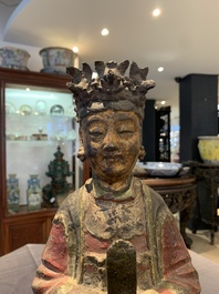 A large Chinese polychrome-lacquered and gilt bronze Daoist immortal, 17th C.