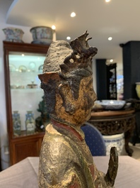 A large Chinese polychrome-lacquered and gilt bronze Daoist immortal, 17th C.