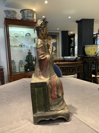 A large Chinese polychrome-lacquered and gilt bronze Daoist immortal, 17th C.