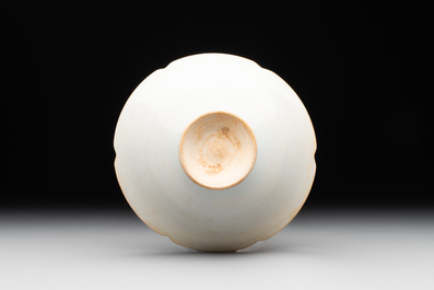 A pair of Chinese qingbai vases and a cup on a stand, 20th C.