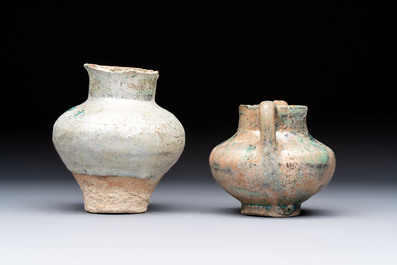 Two Raqqa turquoise-glazed pottery jars with black design, Syria, 12/13th C.